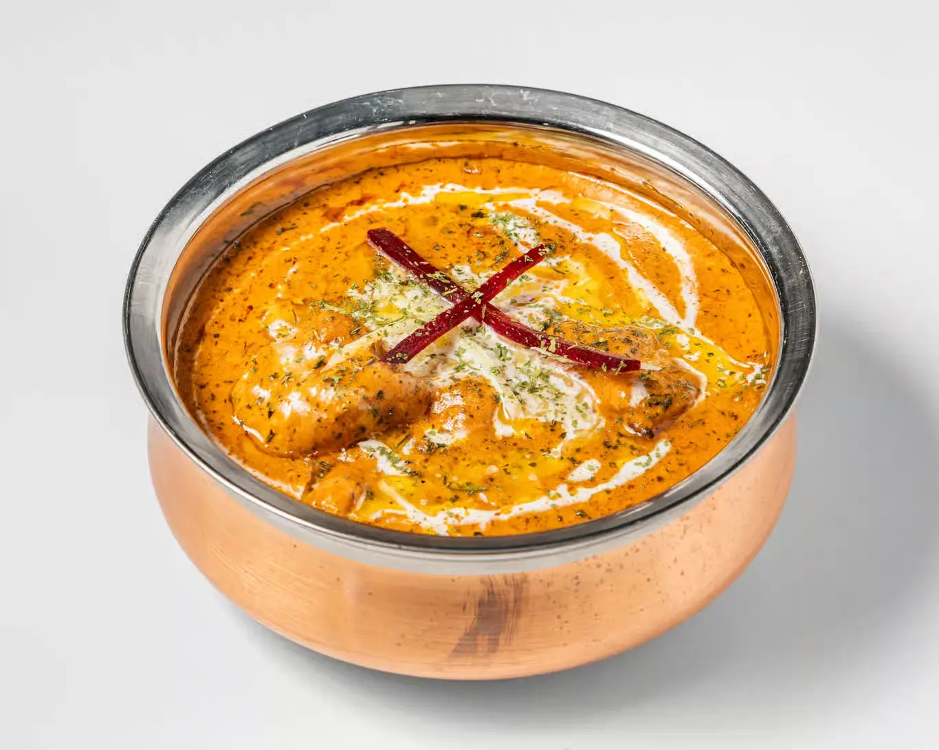 Karma Fine Indian Cuisine Butter Chicken — creamy tomato sauce, boneless chicken, Calgary SE