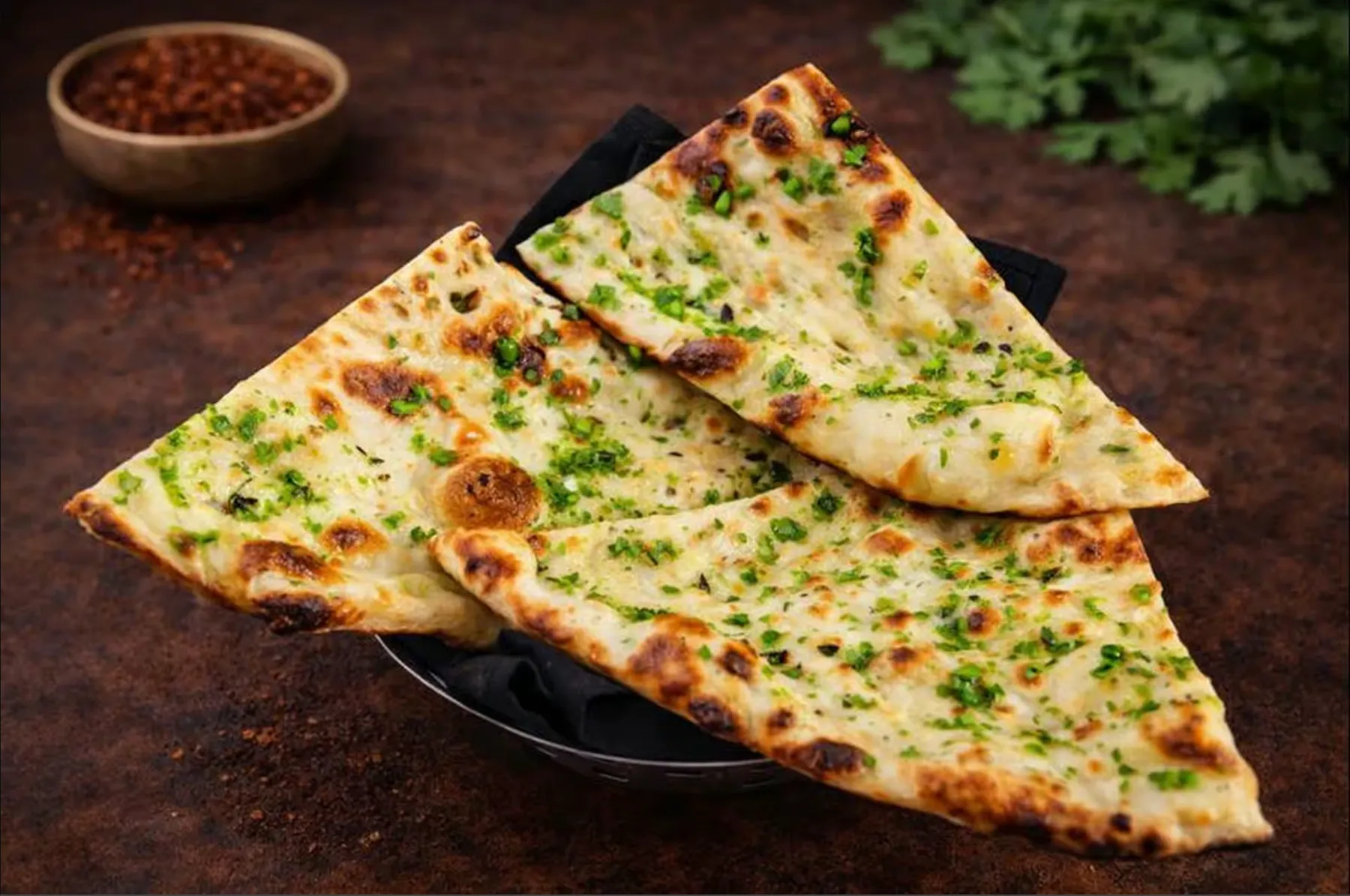 Karma Fine Indian Cuisine Garlic Naan — fresh tandoor-baked flatbread with garlic, Calgary SE